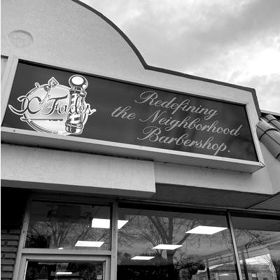 CC Fades sign reading Redefining the Neighborhood Barbershop